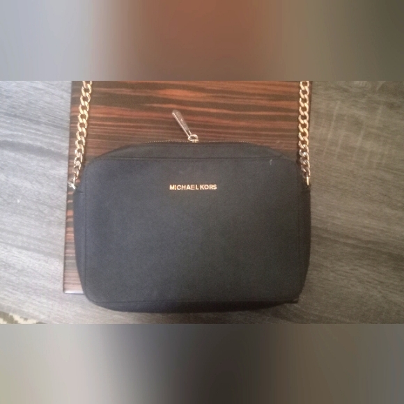 Michael Kors Handbags - Michael kors purse all black with gold rings and you can add the wallet to